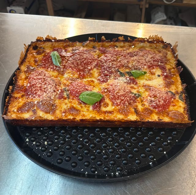 Detroit style Pizza LG 10x14 (Allowed an extra 15 minutes) 8 slices.